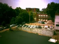 brick building camera:digital_harinezumi city exterior orientation:landscape parking_lot photographer:deaddeaddeath plant tree vehicle // 1600x1200 // 133KB