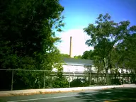 camera:digital_harinezumi exterior fence orientation:landscape photographer:deaddeaddeath plant road sidewalk smokestack tower tree // 1600x1200 // 284KB