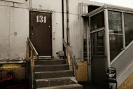 building camera:fujifilm_x100 chair concrete door exterior metal orientation:landscape photographer:deaddeaddeath rust stairs weathered wood // 1728x1152 // 320KB