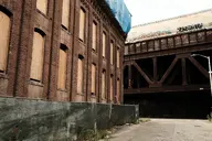 bandoned bridge building camera:fujifilm_x100 city exterior industrial orientation:landscape photographer:deaddeaddeath road sidewalk train utility_pole // 1728x1152 // 387KB