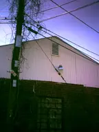 brick building camera:digital_harinezumi orientation:portrait overgrown photographer:deaddeaddeath power_line utility_pole window // 1200x1600 // 138KB