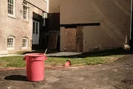 brick camera:fujifilm_x100 construction dirt exterior grass orientation:landscape photographer:deaddeaddeath siding stone traffic_cone trash window wood // 1728x1152 // 440KB