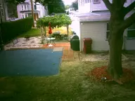 apartment camera:digital_harinezumi exterior flag house orientation:landscape photographer:deaddeaddeath plant trash tree umbrella utility_pole yard // 1600x1200 // 199KB