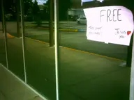 camera:digital_harinezumi exterior orientation:landscape parking_lot photographer:deaddeaddeath reflection sidewalk sign text window // 1600x1200 // 76KB