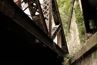 bridge camera:fujifilm_x100 concrete exterior metal orientation:landscape overgrown photographer:deaddeaddeath plant rust stone weathered // 1728x1152 // 332KB