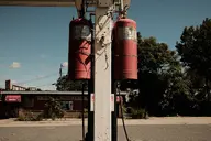 building camera:fujifilm_x100 exterior gas_station metal orientation:landscape photographer:deaddeaddeath rust string_lights strip_club // 1728x1152 // 286KB