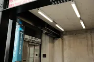 bus_station camera:fujifilm_x100 concrete elevator exterior orientation:landscape photographer:deaddeaddeath sign text train_station // 1728x1152 // 186KB