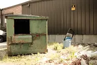 brick building camera:fujifilm_x100 dumpster exterior grass orientation:landscape photographer:deaddeaddeath siding sign text trash // 1728x1152 // 271KB